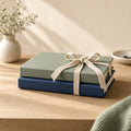 Two notebooks tied together for a two-lesson pack
